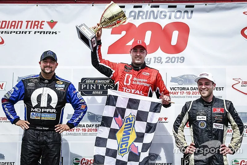 Kevin Lacroix celebrates winning with runner-up Andrew Ranger and third-place finisher Gary Klutt