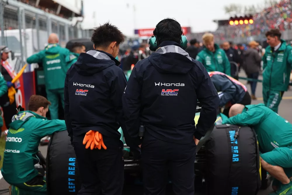 Honda Racing team members on the grid.