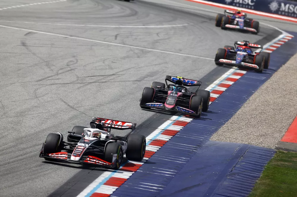 Kevin Magnussen, Haas VF-24, leads Pierre Gasly, Alpine A524, Daniel Ricciardo, VCARB 01, and Yuki Tsunoda, VCARB 01