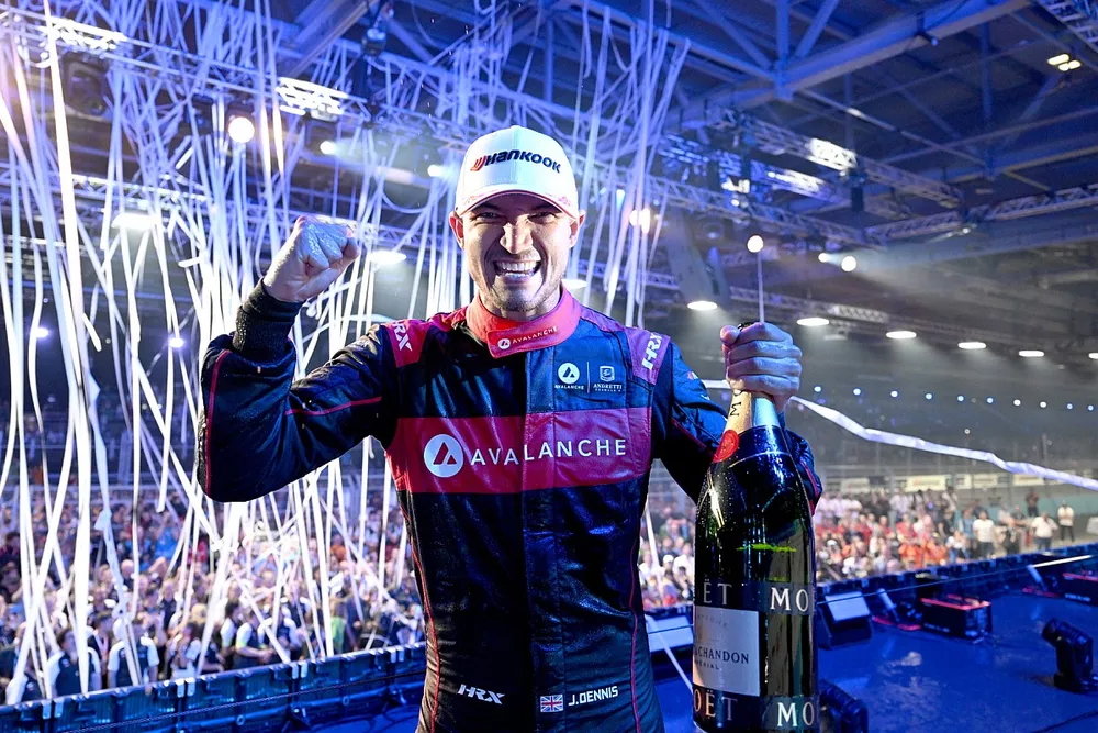 Jake Dennis, Andretti Autosport, 2nd position, celebrates championship victory on the podium