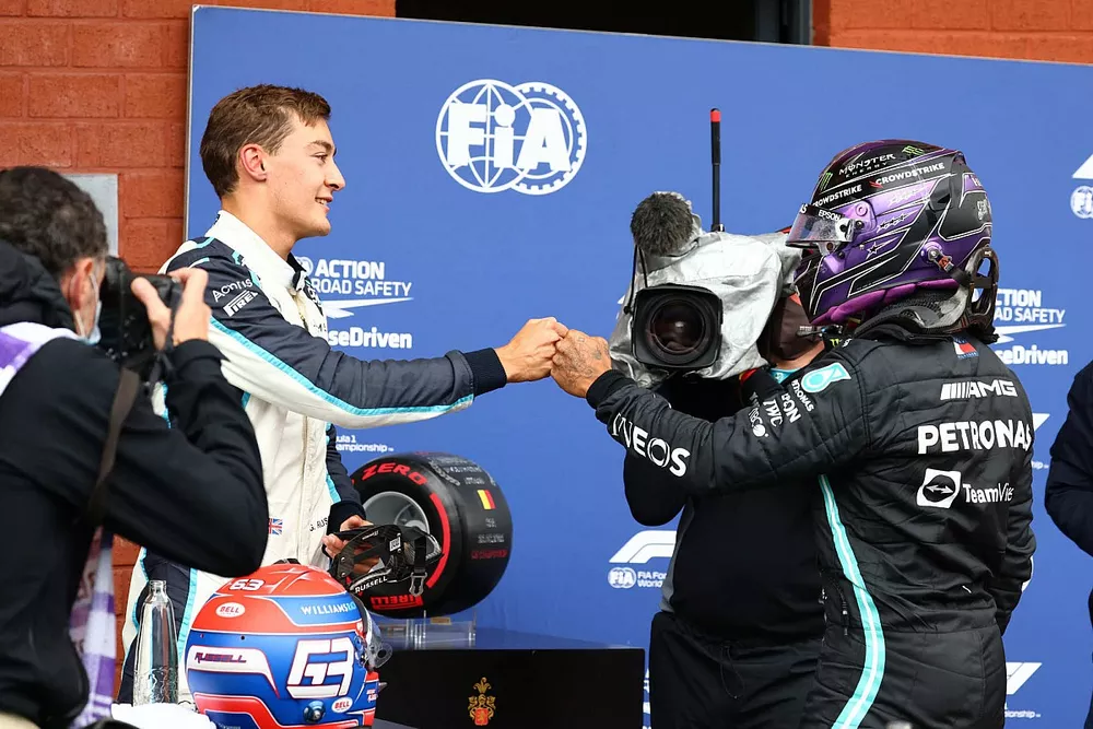 George Russell, Williams, and Lewis Hamilton, Mercedes, congratulate each other in Parc Ferme after Qualifying