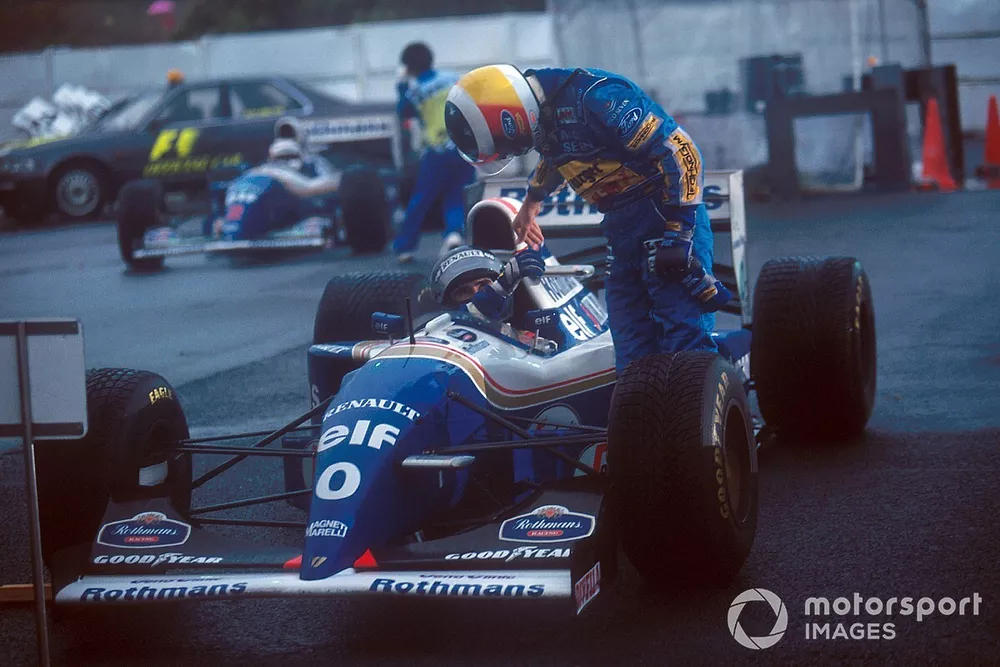 Race winner Damon Hill, Williams FW16B Renault  is congratulated by Michael Schumacher,  Benetton Ford