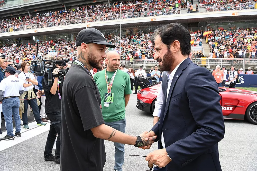 Neymar on the grid with Mohammed bin Sulayem, President, FIA
