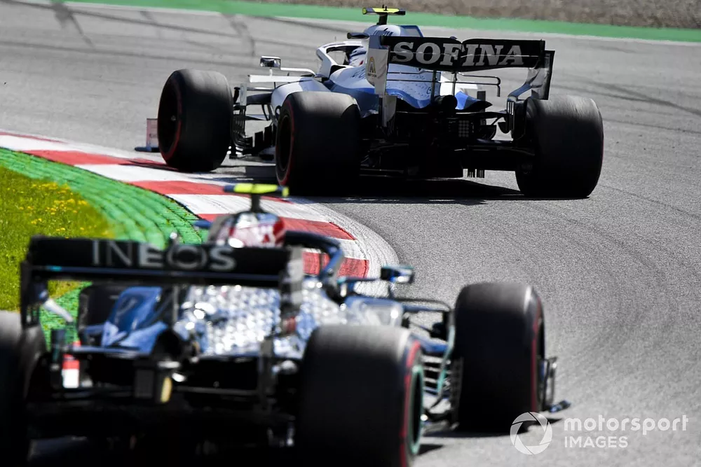 Nicholas Latifi, Williams FW43, leads Valtteri Bottas, Mercedes F1 W11 EQ Performance