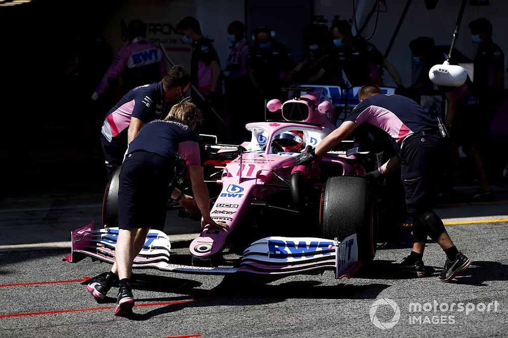 Sergio Perez, Racing Point RP20, is returned to the garage