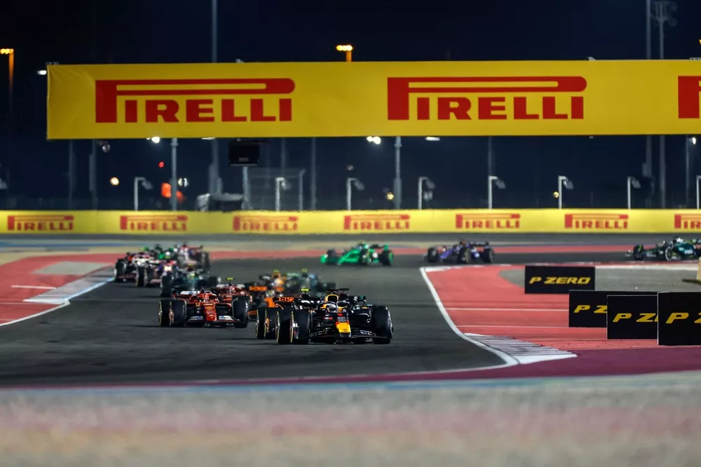 Max Verstappen, Red Bull Racing RB20, Lando Norris, McLaren MCL38, George Russell, Mercedes F1 W15, Charles Leclerc, Ferrari SF-24, the rest of the field