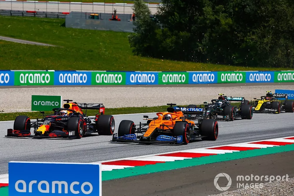 Max Verstappen, Red Bull Racing RB16, leads a sparking Carlos Sainz Jr., McLaren MCL35, Valtteri Bottas, Mercedes F1 W11 EQ Performance and Esteban Ocon, Renault F1 Team R.S.20