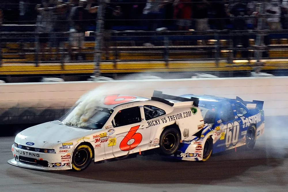 Ricky Stenhouse Jr. (No. 6) and Roush teammate Carl Edwards (No. 60) crash while battling for the win
