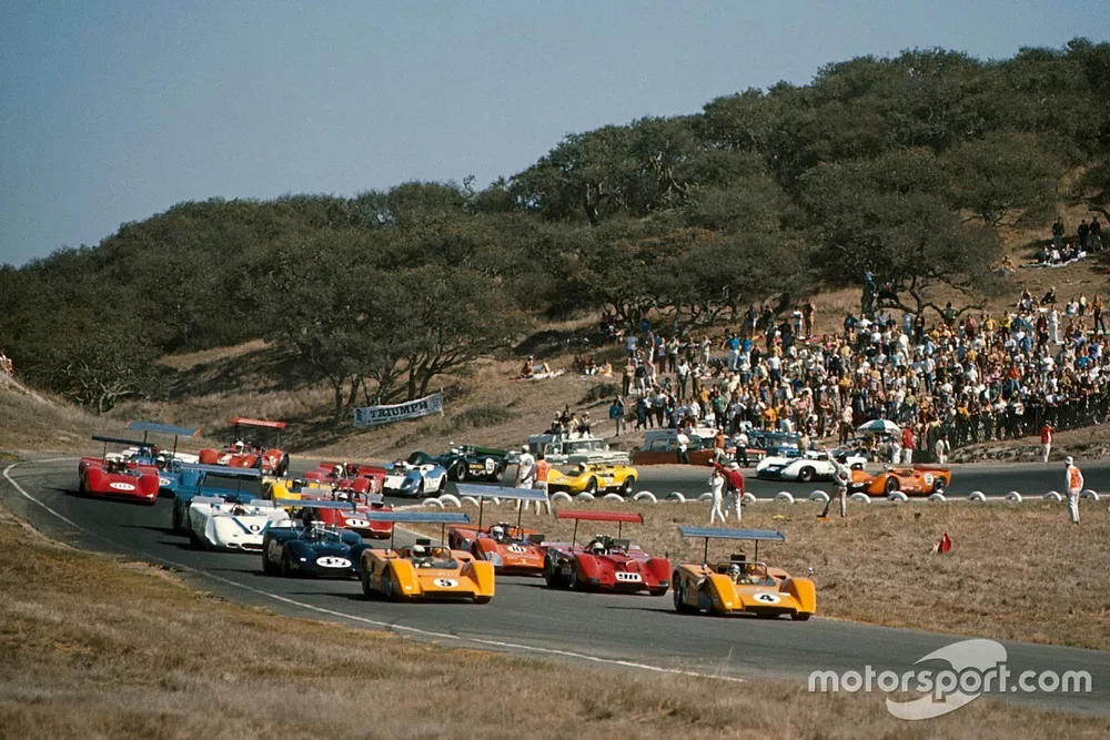 Denny Hulme, McLaren M8B Chevrolet and Bruce McLaren, McLaren M8B Chevrolet lead the field