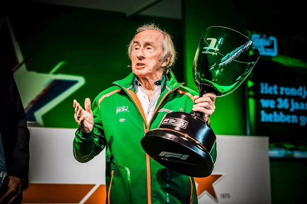 Sir Jackie Stewart holding the Dutch GP trophy
