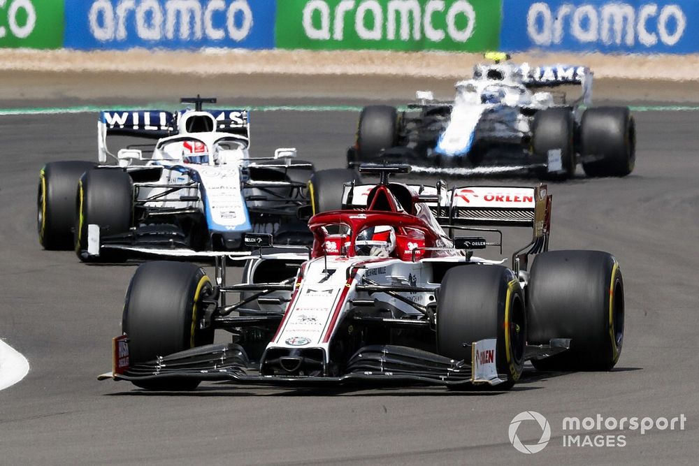 Kimi Raikkonen, Alfa Romeo Racing C39, George Russell, Williams FW43 and Nicholas Latifi, Williams FW43 