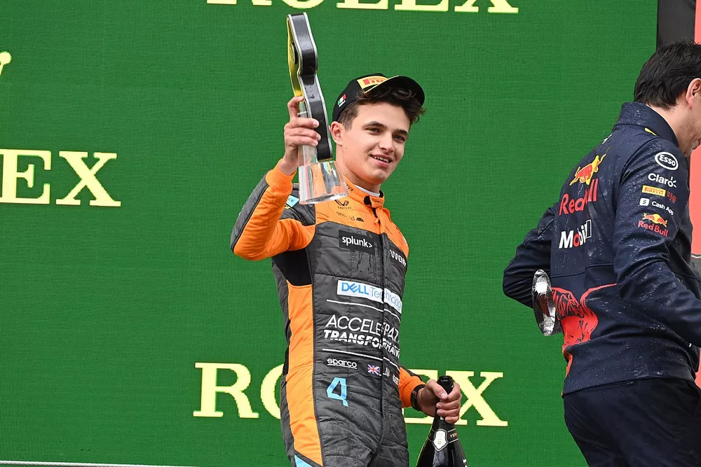 Lando Norris, McLaren, 3rd position, with his trophy and Champagne