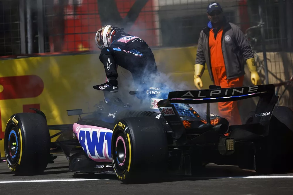 Pierre Gasly, Alpine A523, parks up and climbs out of his car due to a fire onboard