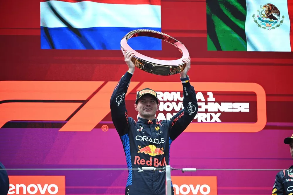 Max Verstappen, Red Bull Racing, 1st position, lifts the winners trophy