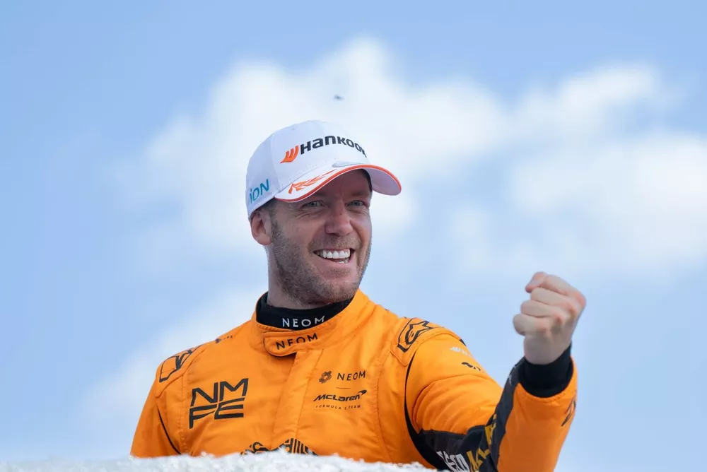 Sam Bird, NEOM McLaren Formula E Team, 1st position, celebrates on the podium