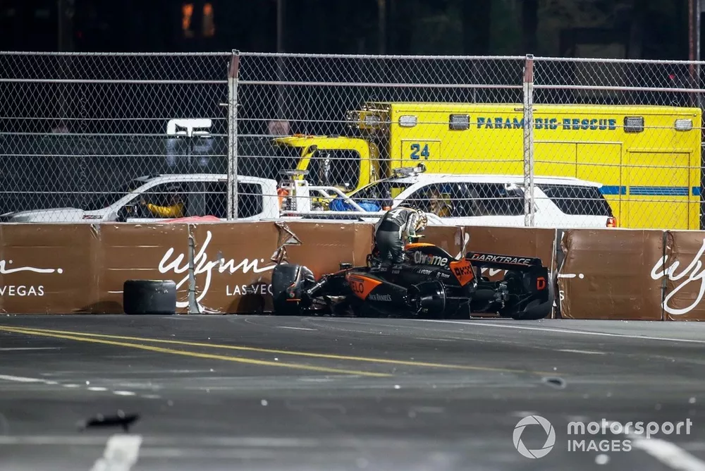 Lando Norris, McLaren MCL60, climbs out of his car after crashing out of the race