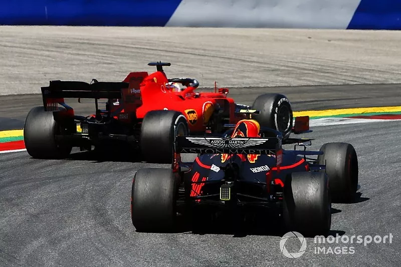 Sebastian Vettel, Ferrari SF90 and Pierre Gasly, Red Bull Racing RB15 battle