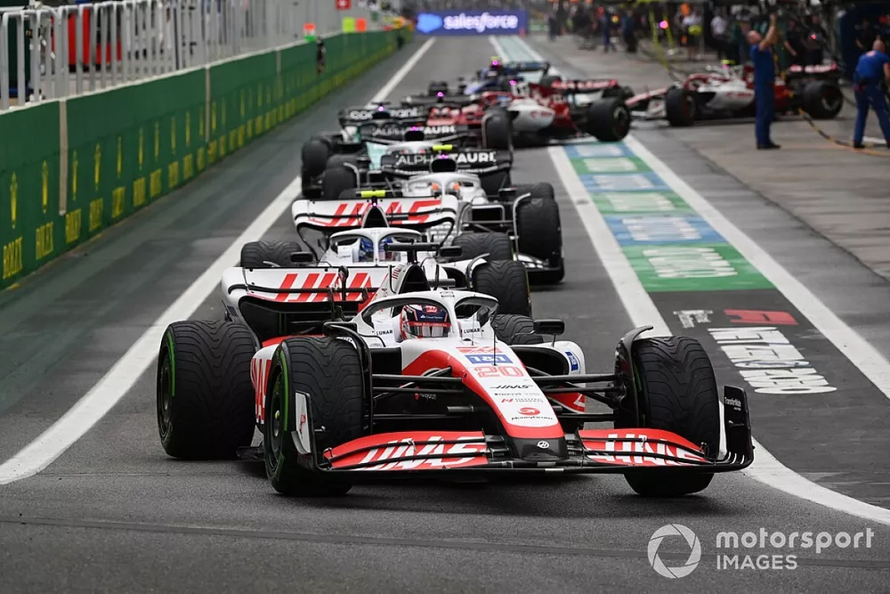 Kevin Magnussen, Haas VF-22, Mick Schumacher, Haas VF-22, out of the pits