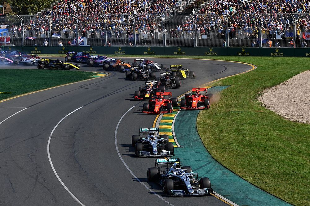 Valtteri Bottas, Mercedes AMG W10, leads Lewis Hamilton, Mercedes AMG F1 W10, Sebastian Vettel, Ferrari SF90, Charles Leclerc, Ferrari SF90, and Max Verstappen, Red Bull Racing RB15, and the rest of the field through the first corner