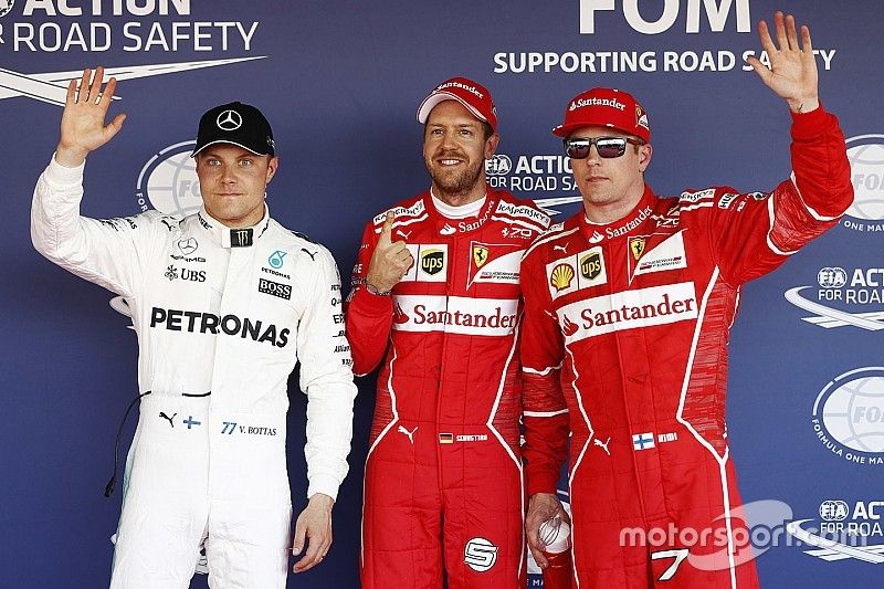 Le poleman Sebastian Vettel, Ferrari, le deuxième, Kimi Raikkonen, Ferrari, le troisième, Valtteri Bottas, Mercedes AMG F1