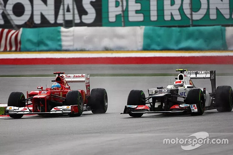 Fernando Alonso, Scuderia Ferrari en Sergio Perez, Sauber F1 Team
