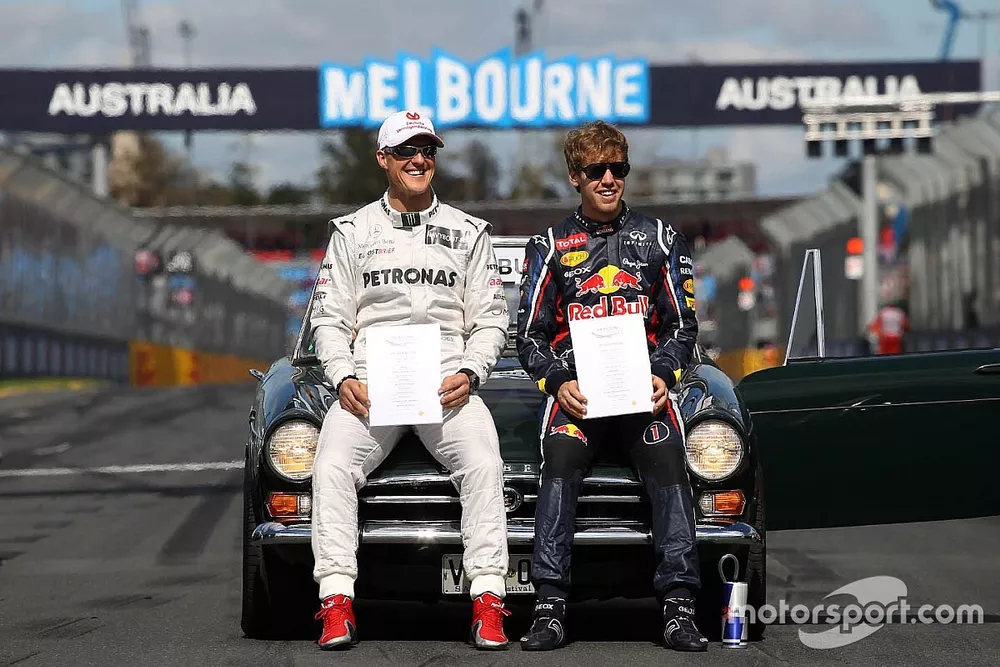Michael Schumacher, Mercedes GP and Sebastian Vettel, Red Bull Racing