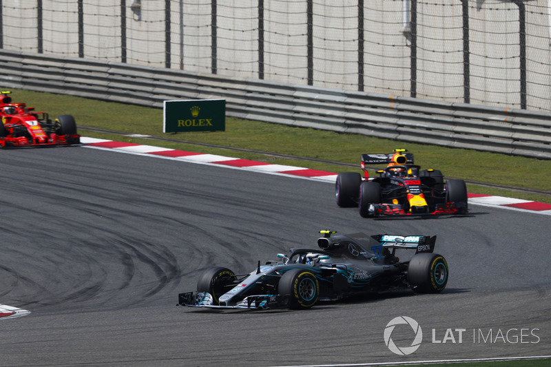 Valtteri Bottas, Mercedes AMG F1 W09, leads Max Verstappen, Red Bull Racing RB14 Tag Heuer, and Kimi Raikkonen, Ferrari SF71H