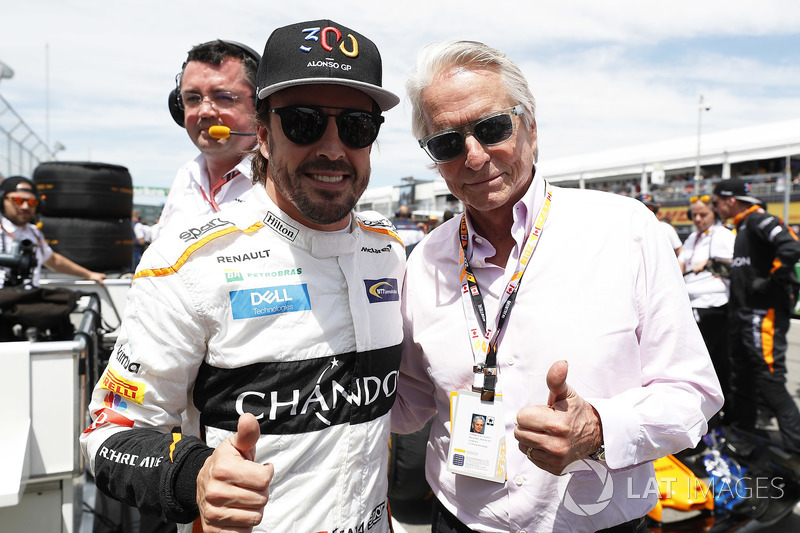 Fernando Alonso, McLaren, and Actor Michael Douglas on the grid