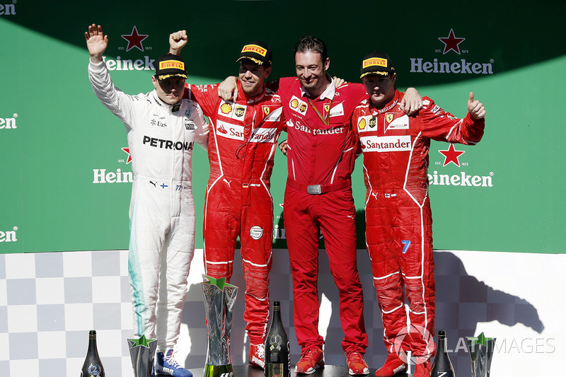 Podio: ganador Sebastian Vettel, Ferrari, segundo lugar Valtteri Bottas, Mercedes AMG F1 y tercer lugar Kimi Raikkonen, Ferrari