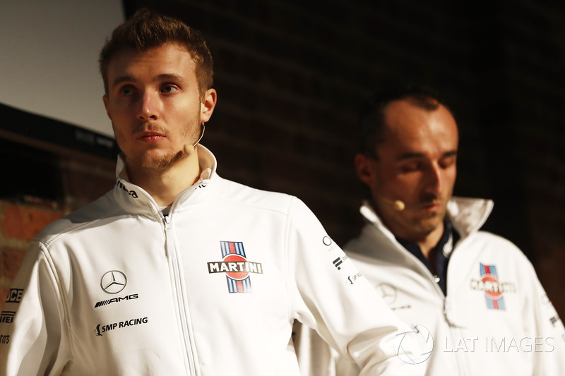 Sergey Sirotkin, Robert Kubica, Williams on stage at the launch of the FW41