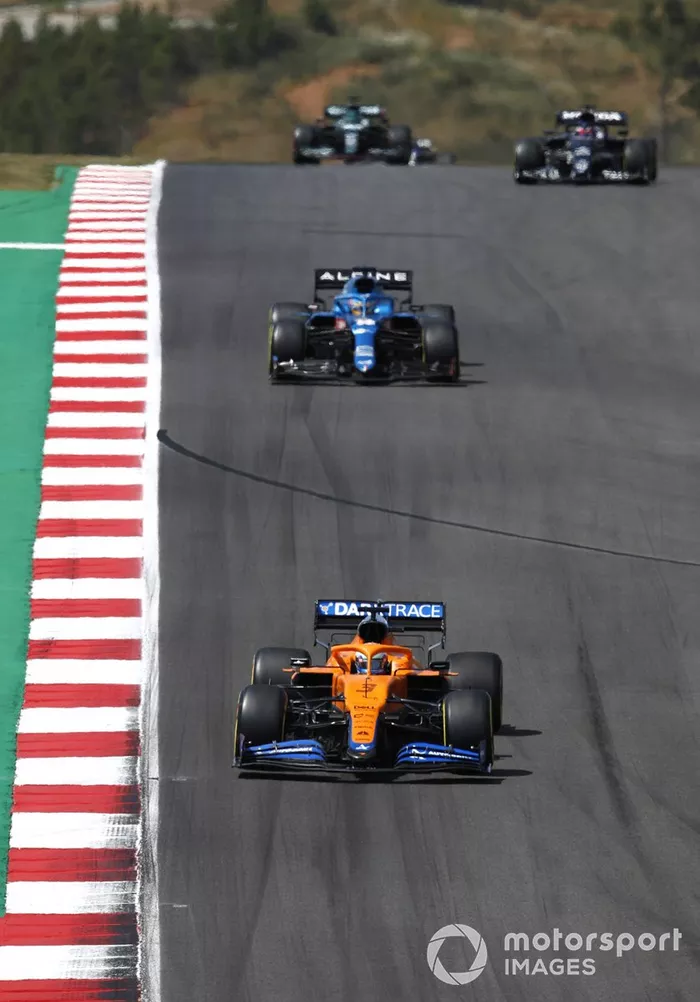 Daniel Ricciardo, McLaren MCL35M, Fernando Alonso, Alpine A521, and Yuki Tsunoda, AlphaTauri AT02