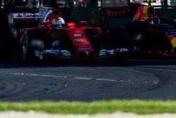Sebastian Vettel, Ferrari SF70H, battles with Max Verstappen, Red Bull Racing RB13