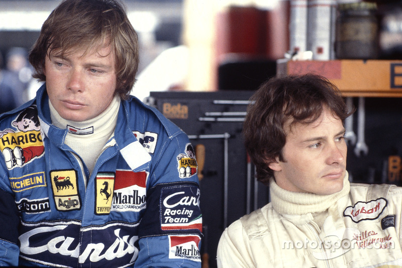 Didier Pironi and Gilles Villeneuve in the pit garage together