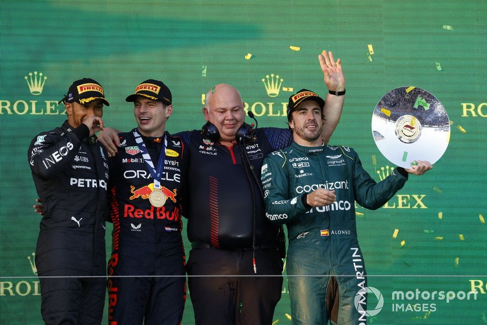 Sir Lewis Hamilton, Mercedes-AMG, 2nd position, Max Verstappen, Red Bull Racing, 1st position, the Red Bull trophy delegate and Fernando Alonso, Aston Martin F1 Team, 3rd position, on the podium