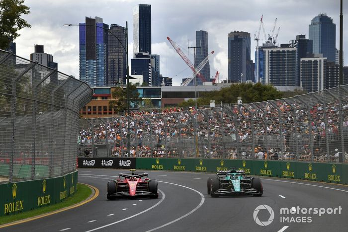 Carlos Sainz Jr, Ferrari F1-75, Lance Stroll, Aston Martin AMR22