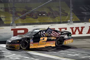 Brad Keselowski, Team Penske, Ford Fusion Miller Genuine Draft celebrates his win