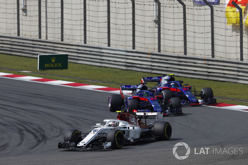 Charles Leclerc, Sauber C37 Ferrari, leads Brendon Hartley, Toro Rosso STR13 Honda, and Pierre Gasly, Toro Rosso STR13 Honda