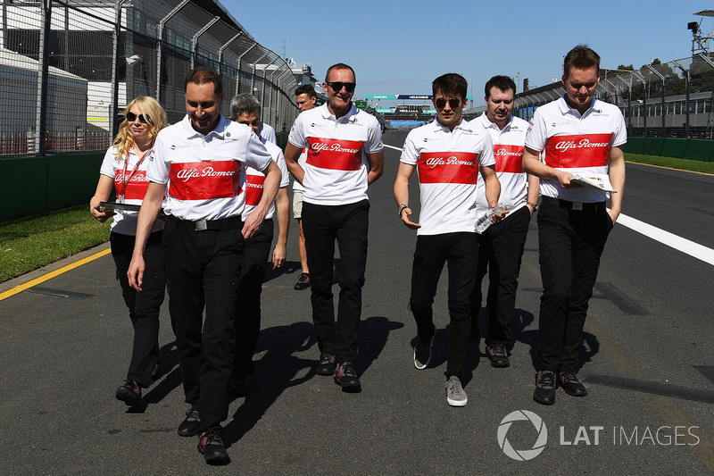 Charles Leclerc, Alfa Romeo Sauber C37 walks the track with the team