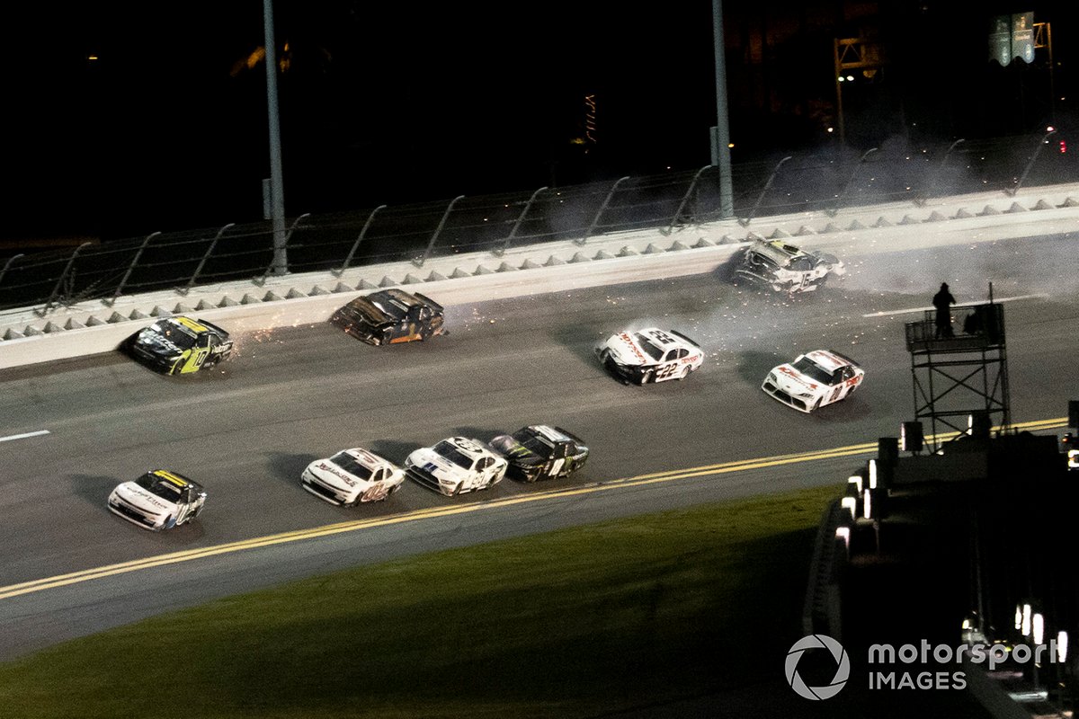 Justin Haley, Kaulig Racing, Chevrolet Camaro leads the field in the last lap as Austin Cindric, Team Penske, Ford Mustang and A.J. Allmendinger, Kaulig Racing, Chevrolet Camaro wreck each other