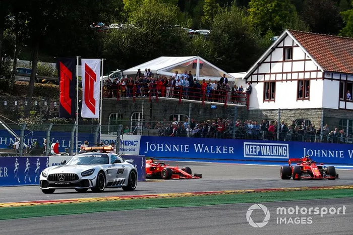 The safety car leads Charles Leclerc, Ferrari SF90 and Sebastian Vettel, Ferrari SF90