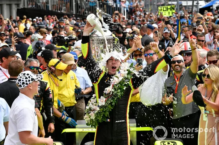 Simon Pagenaud, Team Penske Chevrolet celebrates the win in victory lane with milk