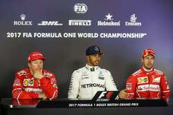 Kimi Raikkonen, Ferrari, pole sitter Lewis Hamilton, Mercedes AMG F1 and Sebastian Vettel, Ferrari i
