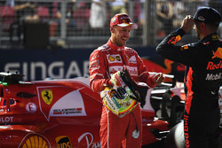 Pole sitter Sebastian Vettel, Ferrari and Daniel Ricciardo, Red Bull Racing in parc ferme