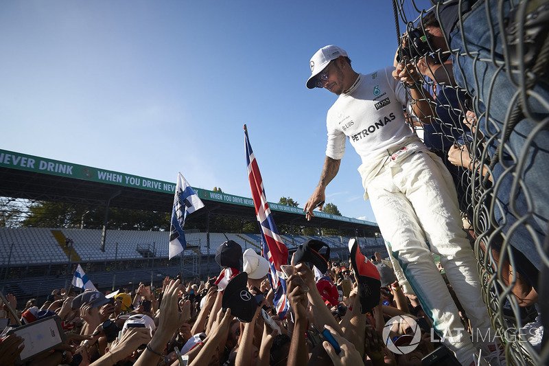 Lewis Hamilton, Mercedes AMG F1, signs autographs for fans