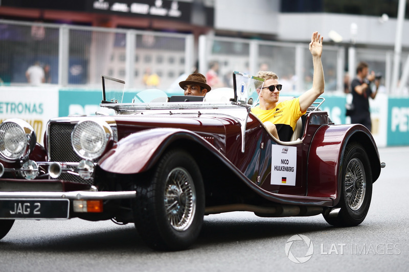Nico Hulkenberg, Renault Sport F1 Team, waves from a Panther J72 on the drivers parade