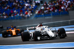 Marcus Ericsson, Sauber C37, leads Fernando Alonso, McLaren MCL33