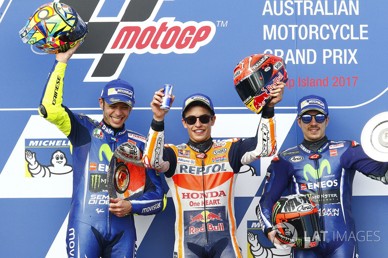 Podium ganador Marc Marquez, Repsol Honda Team, segunda plaza Valentin Rossi, Yamah Factory Racing, 