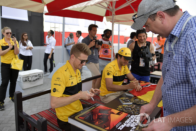 Nico Hulkenberg, Renault Sport F1 Team and Carlos Sainz Jr., Renault Sport F1 Team at the autograph 