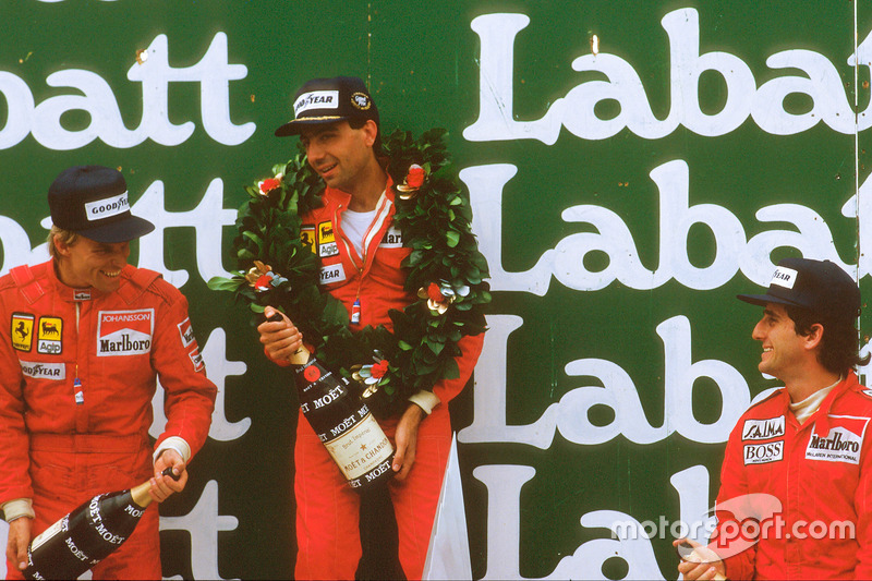 Michele Alboreto, 1st position, Stefan Johansson, 2nd position and Alain Prost, 3rd position on the podium