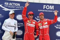 Polesitter Kimi Raikkonen, Ferrari, second place Sebastian Vettel, Ferrari, third place Valtteri Bot
